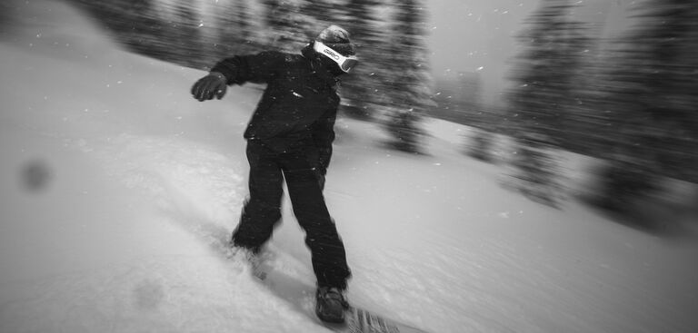 black and white snowboarder